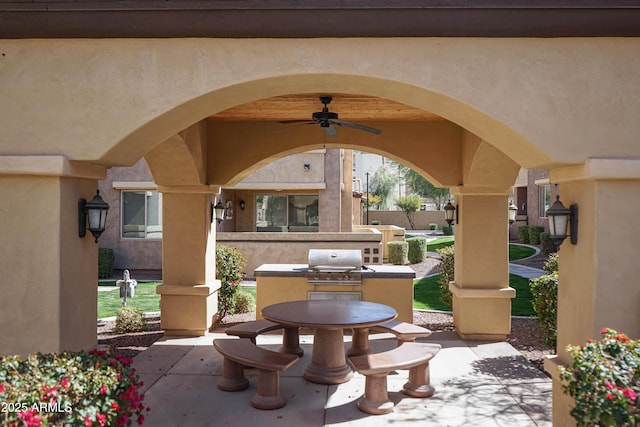 view of patio / terrace with grilling area and ceiling fan