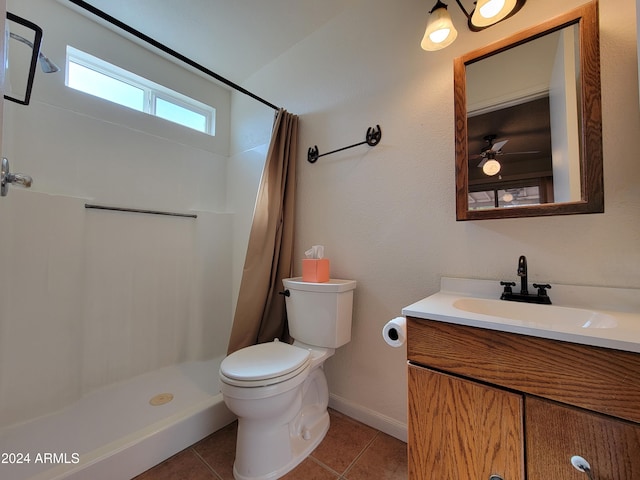 bathroom with tile patterned flooring, a shower with shower curtain, ceiling fan, vanity, and toilet