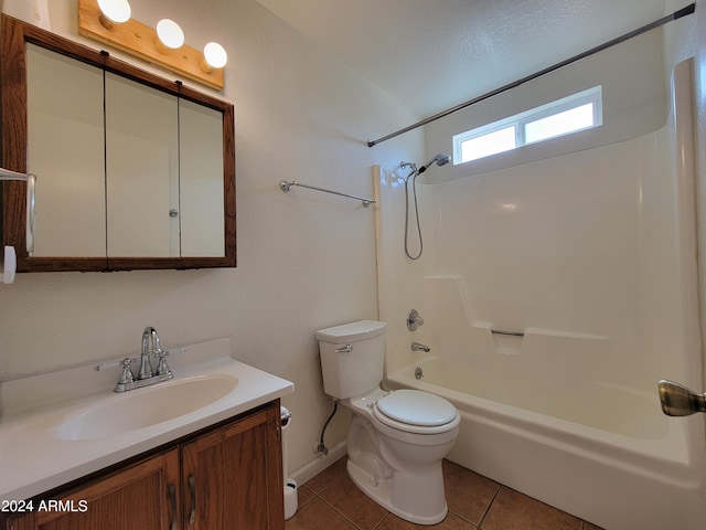 full bathroom featuring toilet, shower / tub combination, vanity, and tile patterned floors