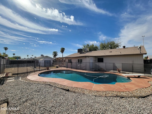 view of swimming pool with a patio area