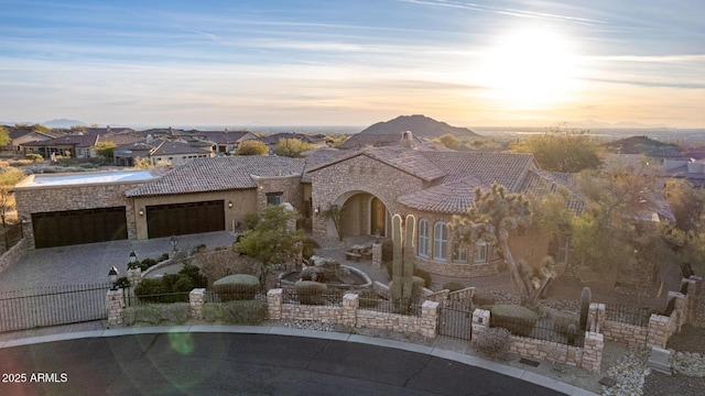 view of front of house with a garage