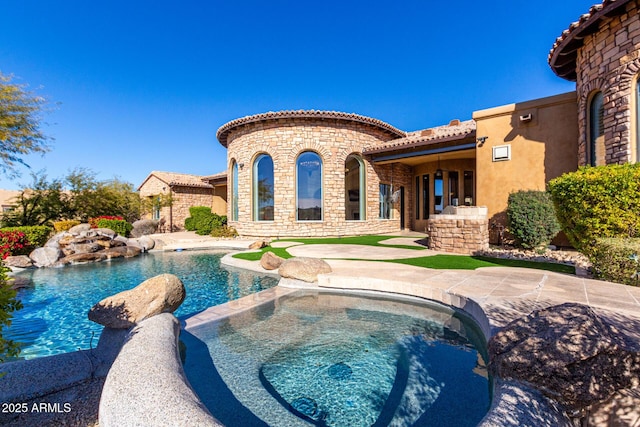 view of swimming pool featuring a patio area