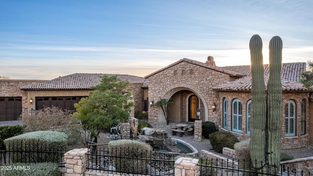 view of front of house with a garage