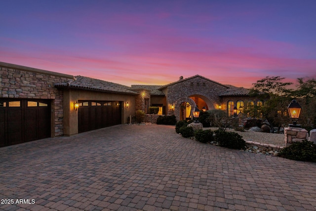 view of front of house with a garage