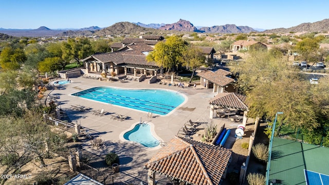 view of pool with a gazebo, a mountain view, and a patio