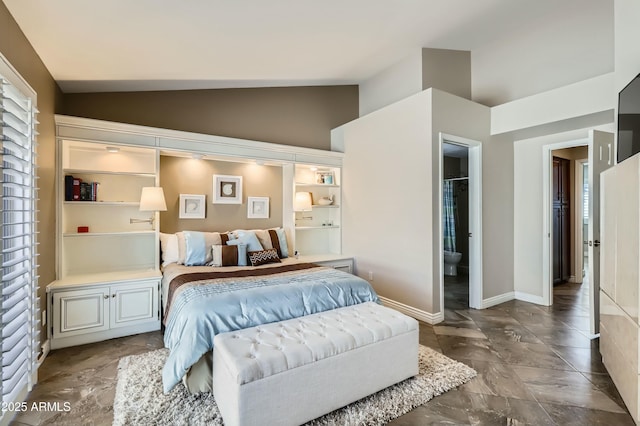 bedroom with lofted ceiling