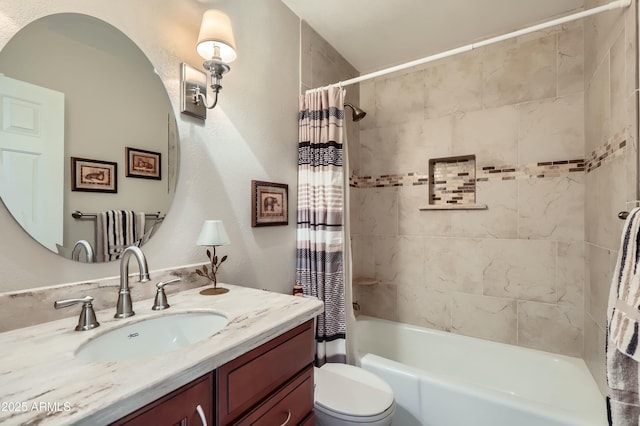 full bathroom with vanity, toilet, and shower / bath combo with shower curtain