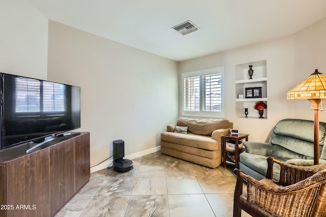 living room with built in shelves