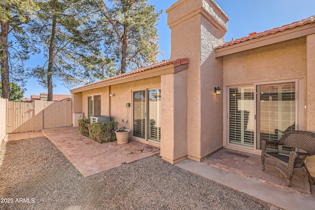 rear view of house with a patio