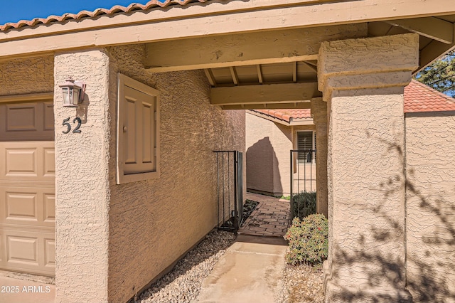 property entrance featuring a garage