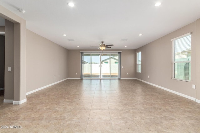 empty room featuring visible vents, baseboards, ceiling fan, and recessed lighting