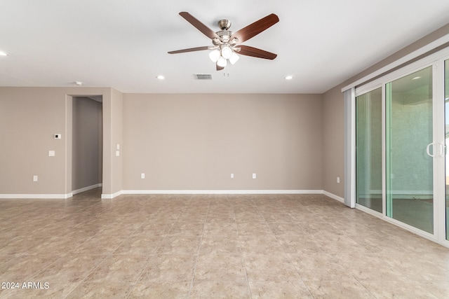 spare room featuring ceiling fan