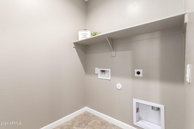 clothes washing area featuring hookup for an electric dryer, gas dryer hookup, baseboards, laundry area, and washer hookup