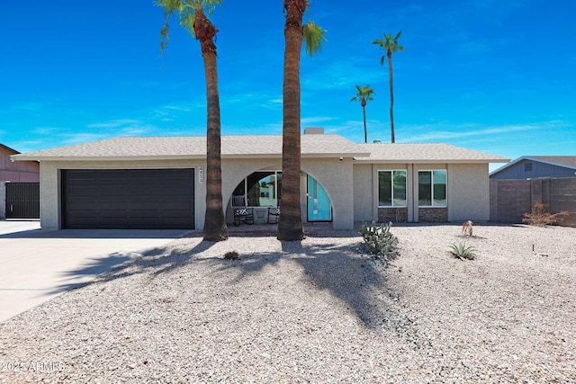 ranch-style home with a garage