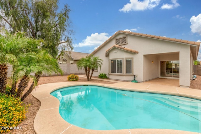view of swimming pool featuring a patio area and a fenced backyard