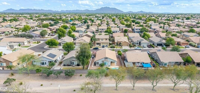 aerial perspective of suburban area featuring a mountain backdrop