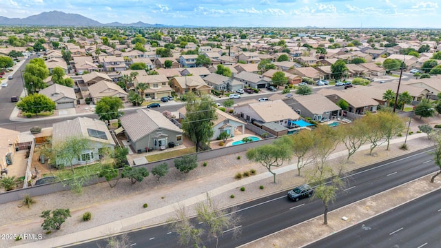 aerial perspective of suburban area featuring a mountainous background