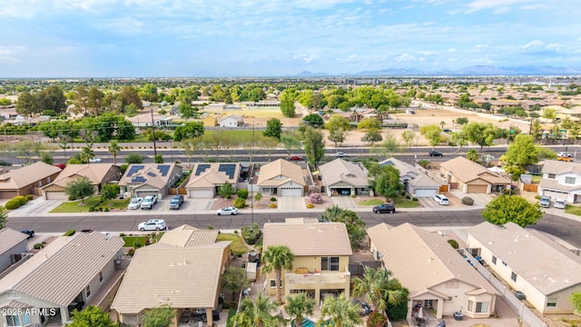 aerial perspective of suburban area with a mountain backdrop