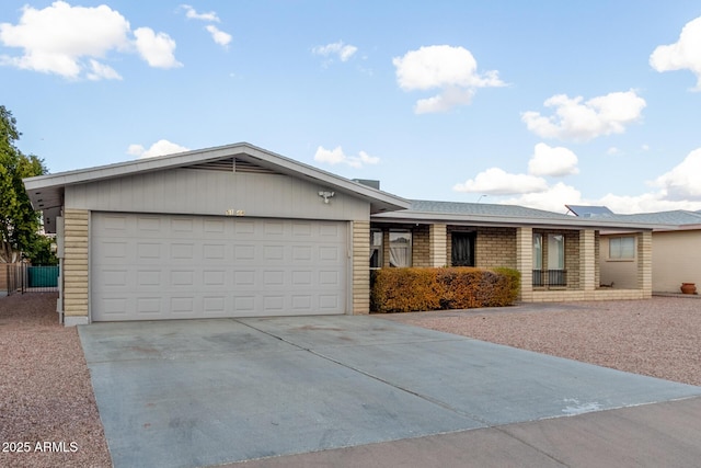 single story home with a garage