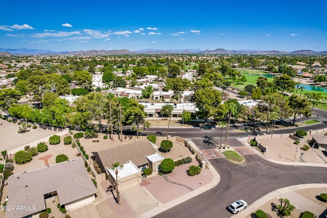 birds eye view of property featuring a mountain view