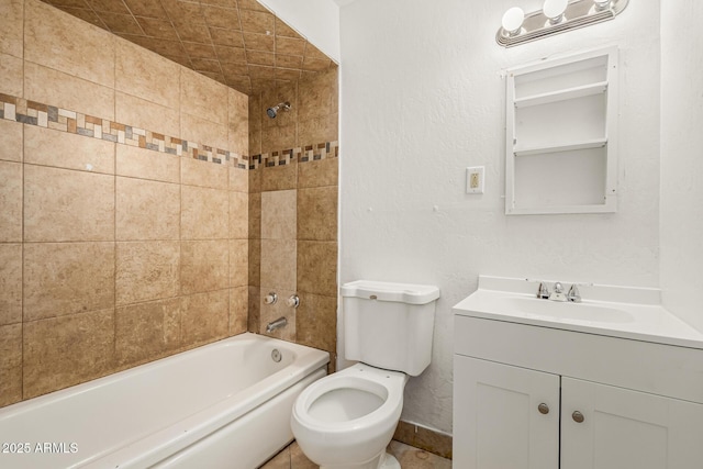 full bath with a textured wall, bathing tub / shower combination, vanity, and toilet