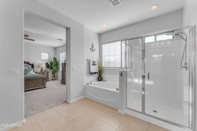 bathroom featuring tile patterned flooring, ceiling fan, and independent shower and bath