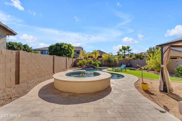 view of swimming pool featuring a patio