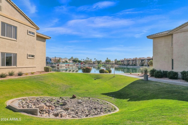 view of yard with a water view