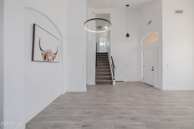 8478 W Grovers Ave, Peoria, AZ 85382 - foyer featuring a high ceiling and stairway