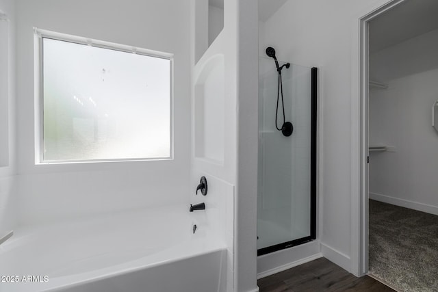 8478 W Grovers Ave, Peoria, AZ 85382 - bathroom with a garden tub, a shower stall, and a spacious closet