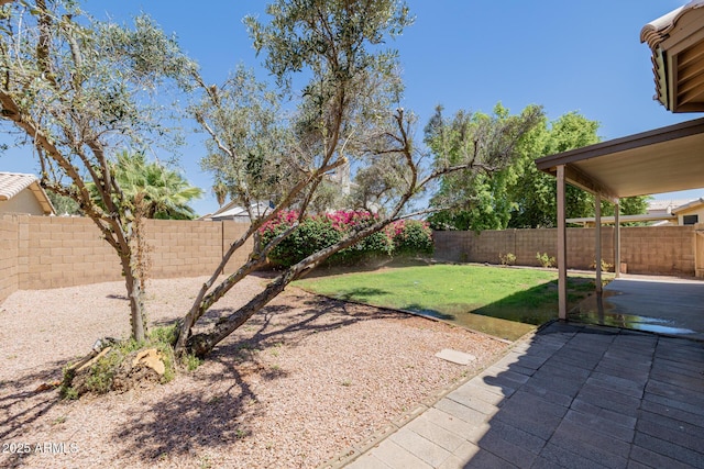 8478 W Grovers Ave, Peoria, AZ 85382 - fenced backyard featuring a patio area