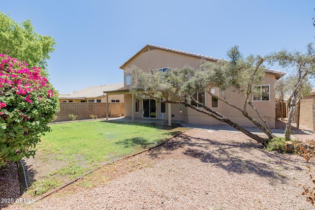 8478 W Grovers Ave, Peoria, AZ 85382 - rear view of property with stucco siding, a patio area, and a tiled roof