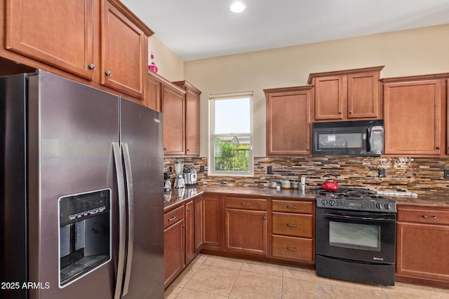 29159 N 128th Ln, Peoria, AZ 85383 - kitchen with black appliances, dark countertops, brown cabinetry, decorative backsplash, and recessed lighting