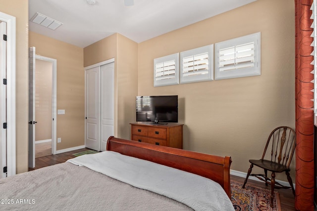 29159 N 128th Ln, Peoria, AZ 85383 - bedroom with wood finished floors, baseboards, and a closet