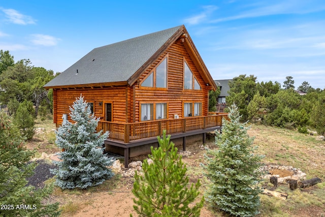 1562 Rock Ridge Cir, Heber, AZ 85928 - back of property with log exterior and a deck