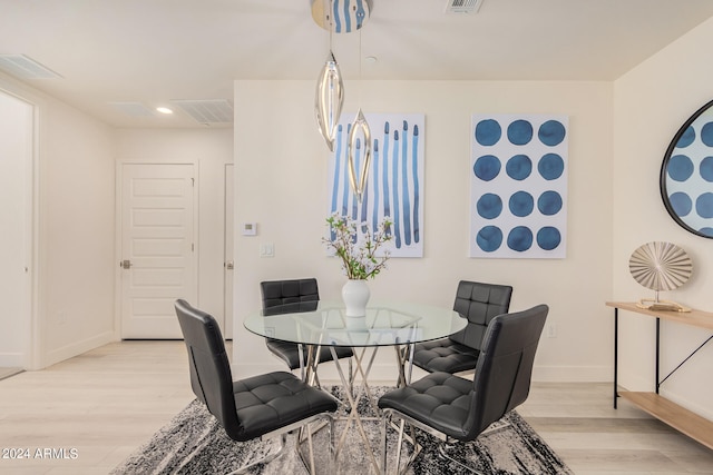 dining area featuring light hardwood / wood-style floors