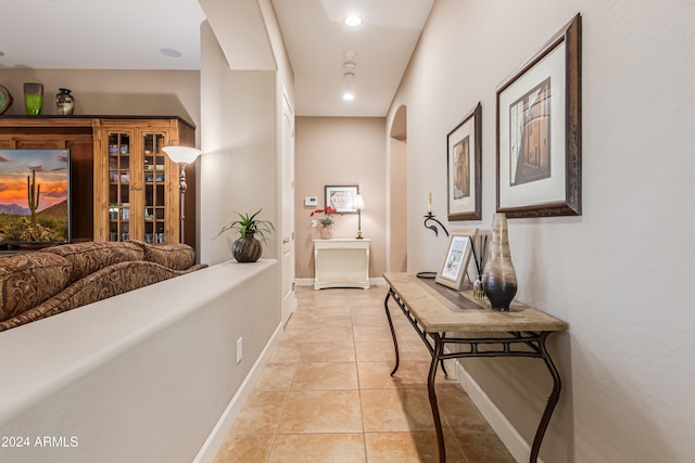 hallway with light tile patterned flooring