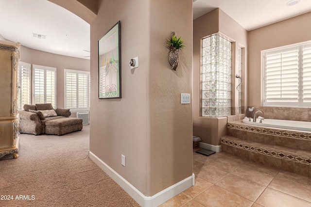 interior space featuring light colored carpet