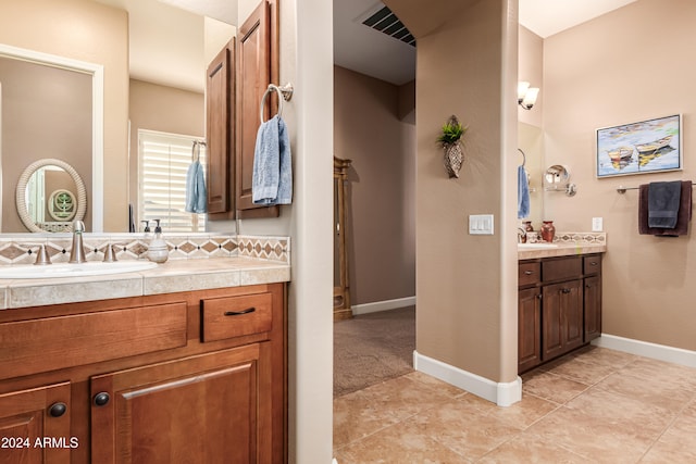 bathroom with vanity and tile patterned floors