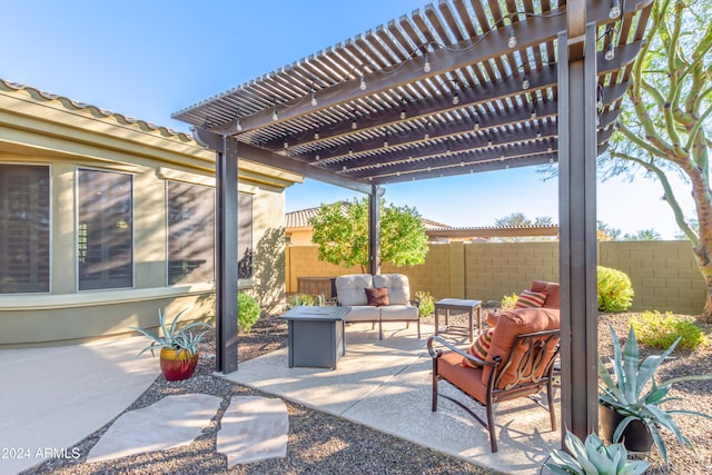 view of patio / terrace with an outdoor hangout area and a pergola