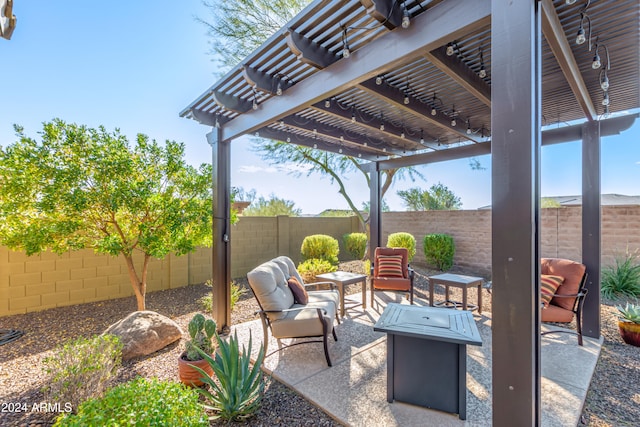 view of patio featuring a pergola