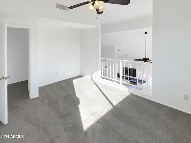 spare room with carpet and ceiling fan