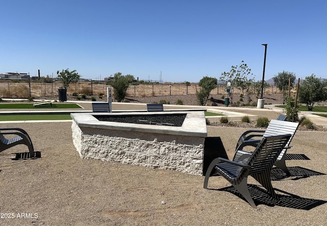 surrounding community featuring fence