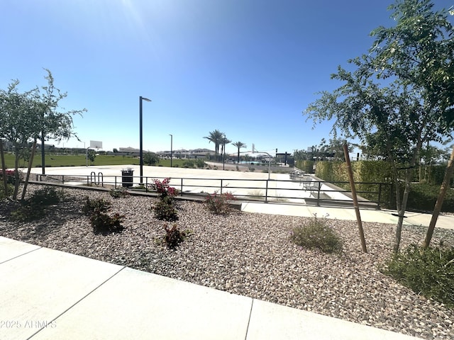 view of property's community with fence