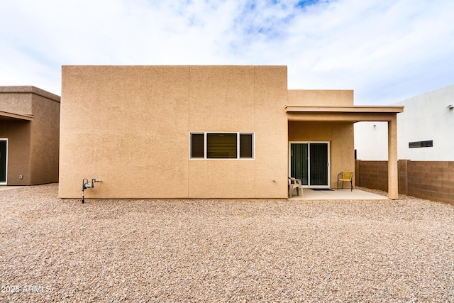 293 S Meadowood Ln, Sierra Vista, AZ 85635 - back of house featuring a patio, stucco siding, and fence