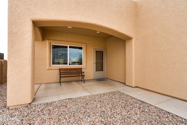 293 S Meadowood Ln, Sierra Vista, AZ 85635 - property entrance with a patio area and stucco siding