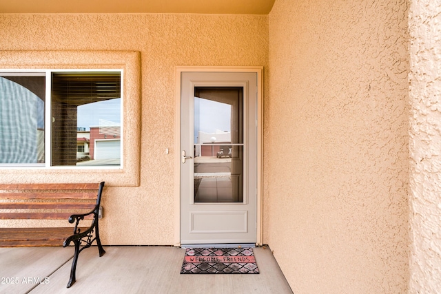 293 S Meadowood Ln, Sierra Vista, AZ 85635 - doorway to property featuring stucco siding