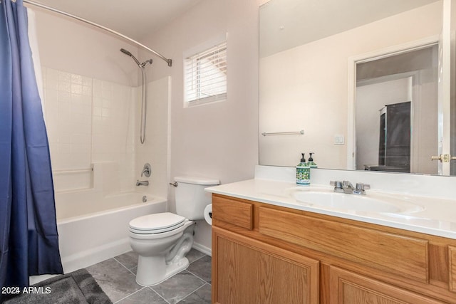 full bathroom featuring toilet, vanity, shower / bath combination with curtain, and tile patterned flooring