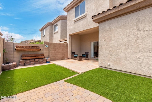 view of yard with a patio area