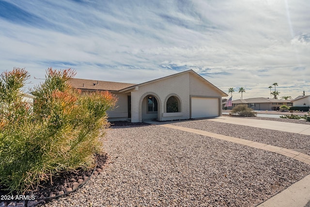 ranch-style home with a garage